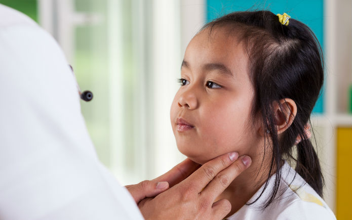Young girl getting her lymph nodes checked